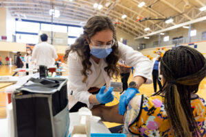 Nurse giving vaccine shot