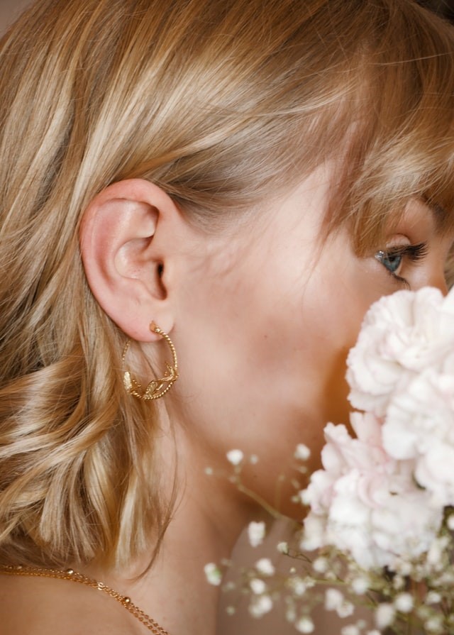 Model with hoop earrings